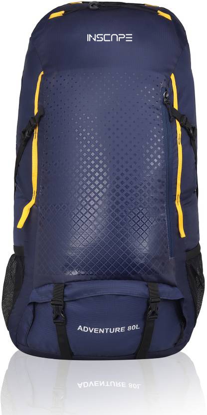 a navy blue trekking bags with geometric print on it and yellow strap with unique design . 80 liter 