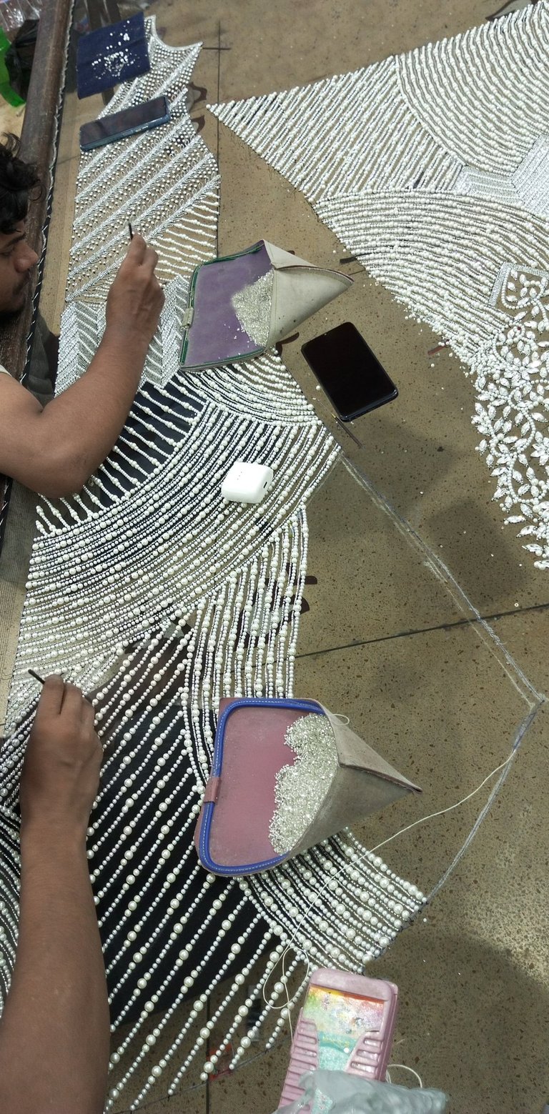 Hand beaded dress by artisan