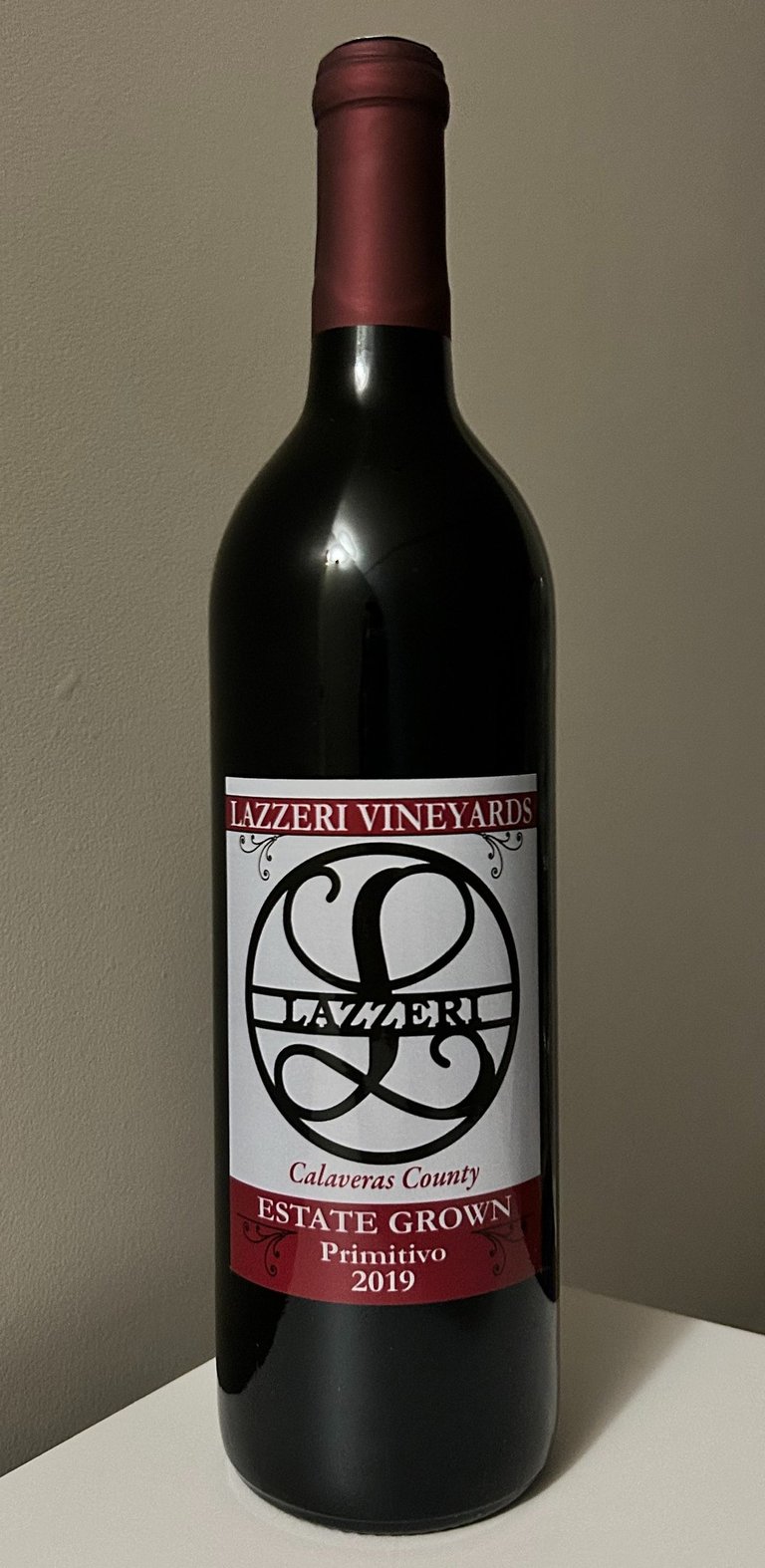 An unopened bottle of red wine.