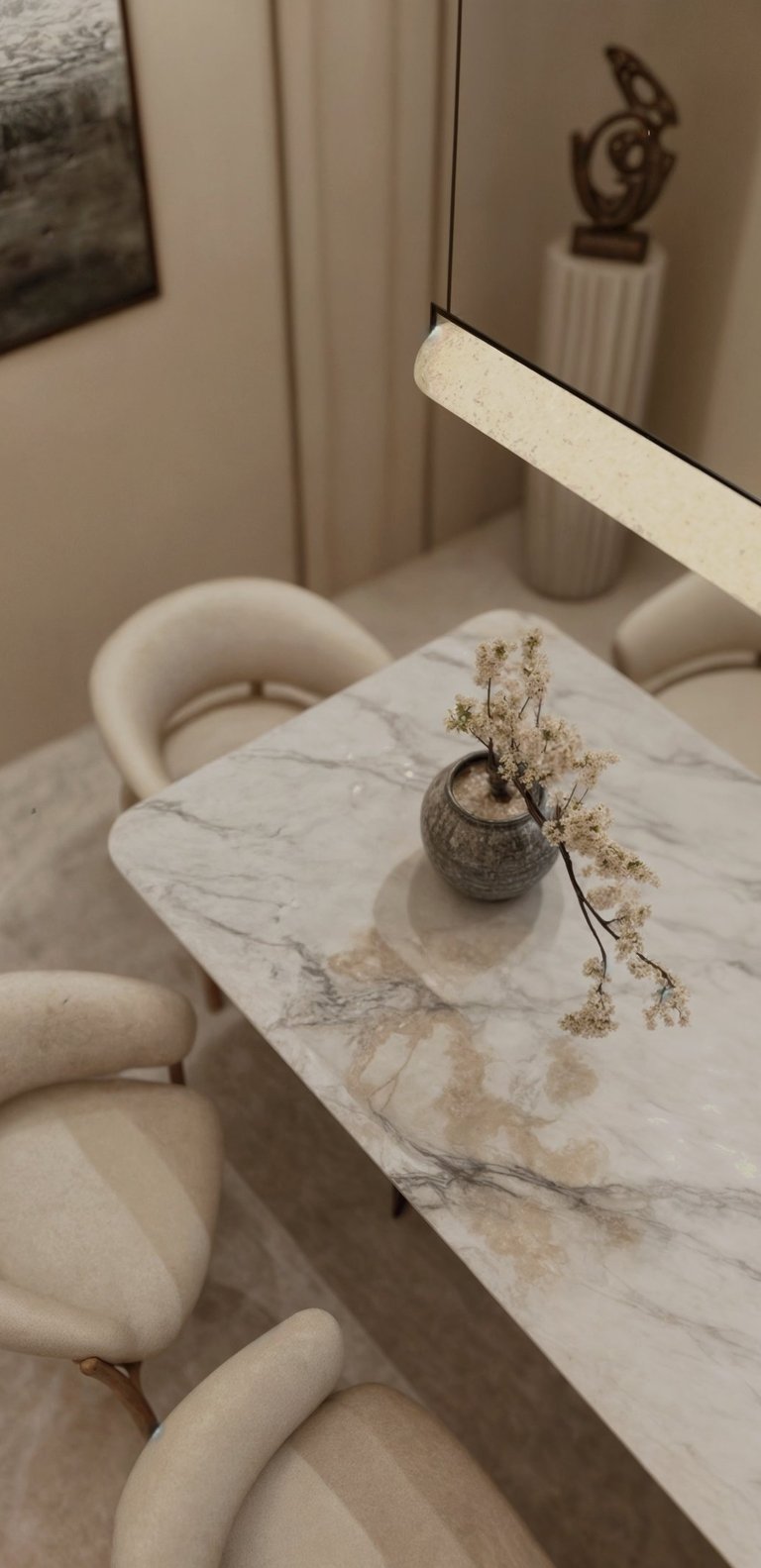 High end marble dining table with pendant lighting in Dubai luxury apartment