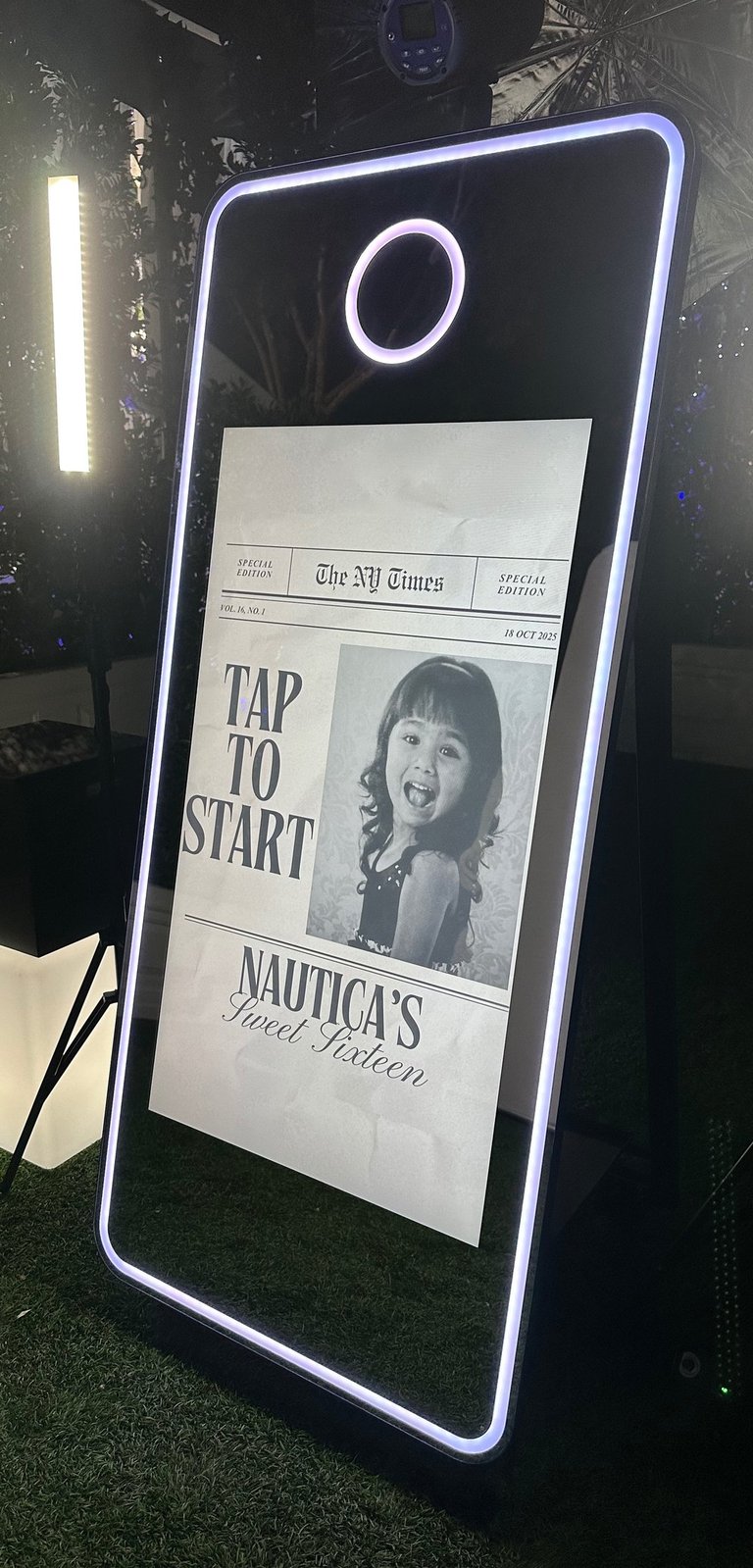 Girl displayed with a tap to start screen at a Sweet 16 Birthday Mirror Photo Booth.
