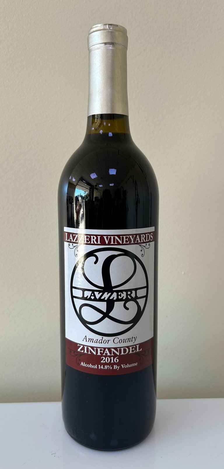 An unopened bottle of wine labeled Zinfandel