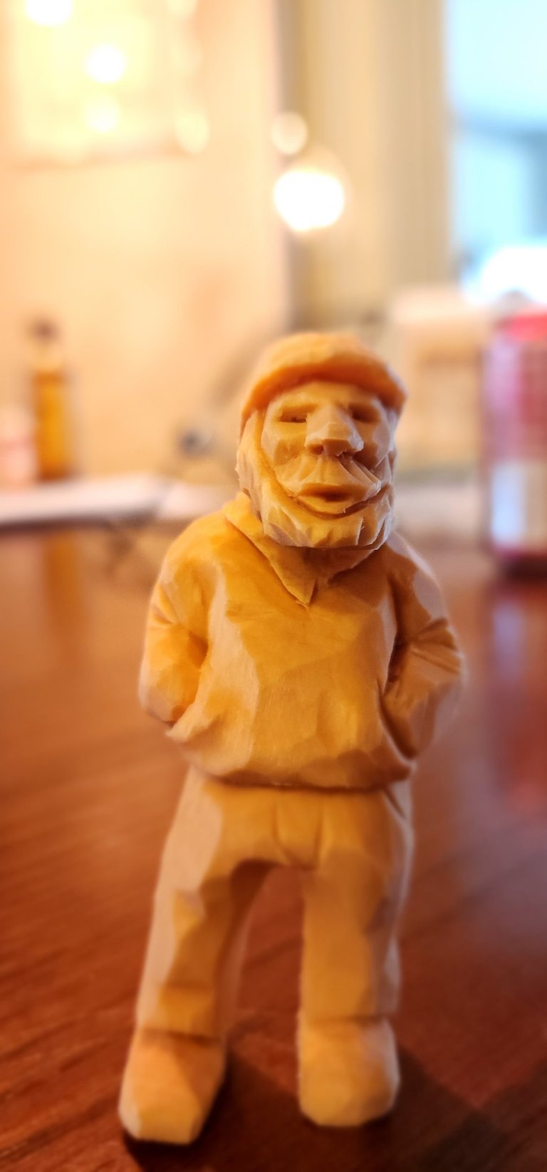 Carved from basswood, old dock yard worker man 2" high.  carved by James Smith
