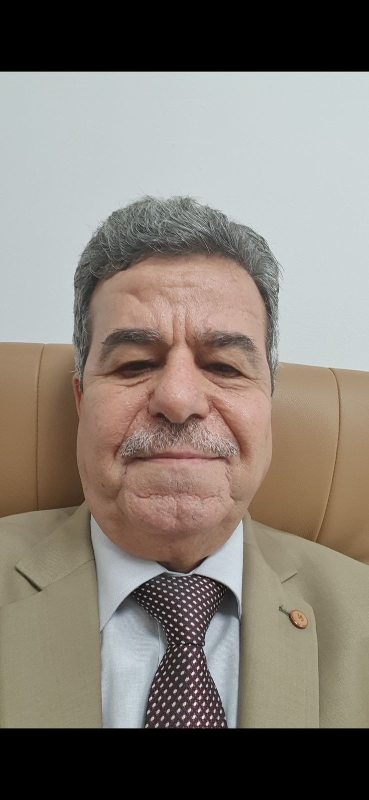 A portrait of trainer Ahmad AlDeghaim