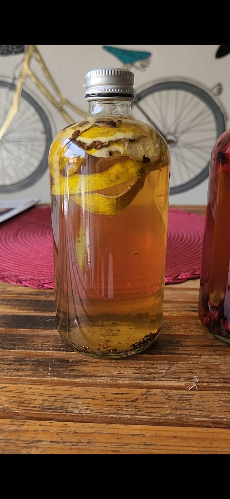 a bottle of kombucha with orange