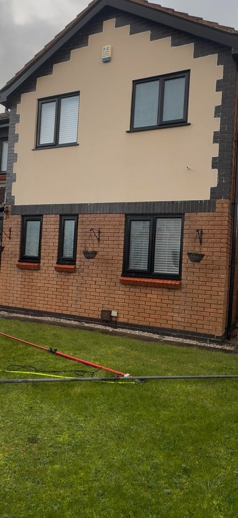 before and after photo of render cleaned by webster exterior in blackpool