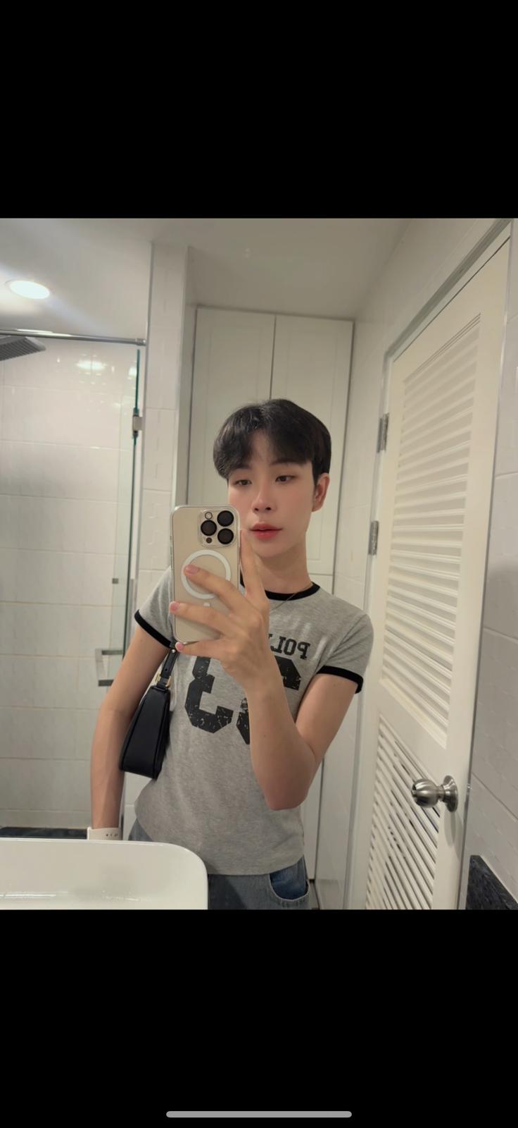 Massage therapist taking selfie at his bathroom in Pattaya