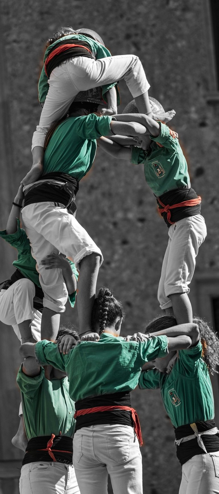 a group of people standing on top of a tower