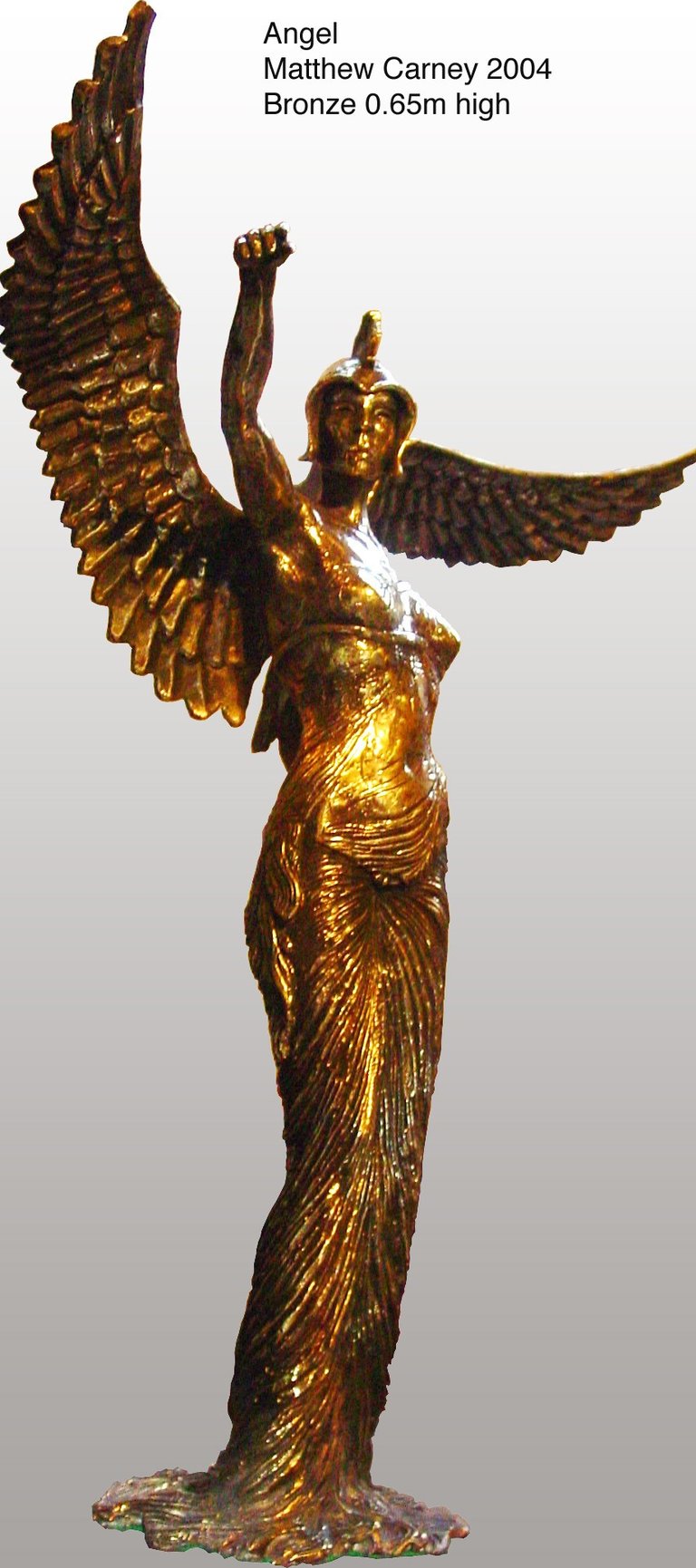 a statue of a female angel warrior