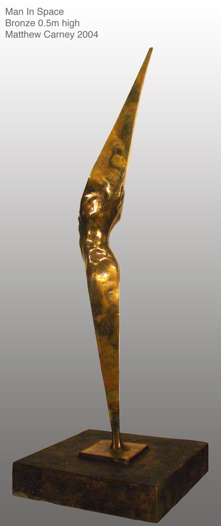 a sculpture of a mans torso inside an abstract shape