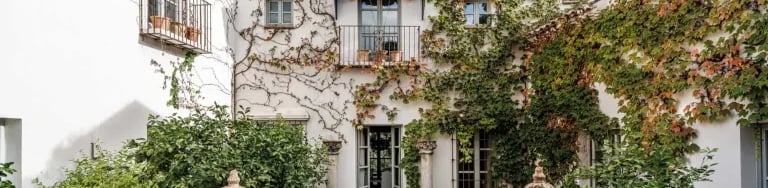 Finca Santa Katerina main courtyard with statues and balconies