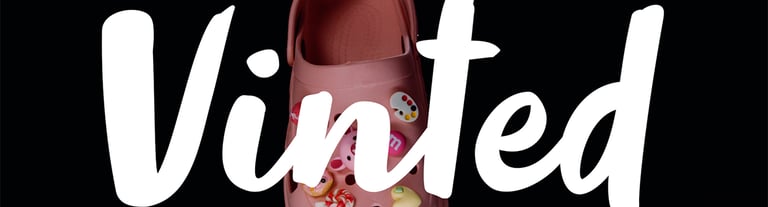 a pair of pink shoes with a pink flowered shoe