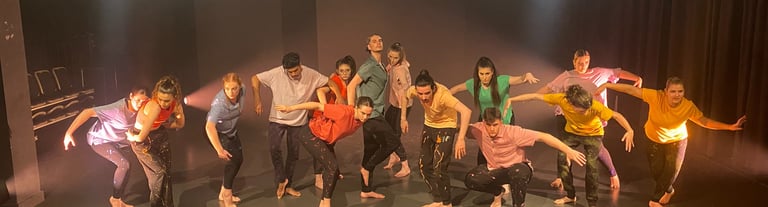 a group of people standing around a stage