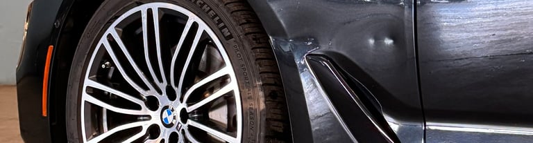 BMW fender damage. Aluminium panel