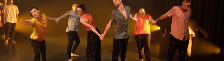 a group of people standing on a stage
