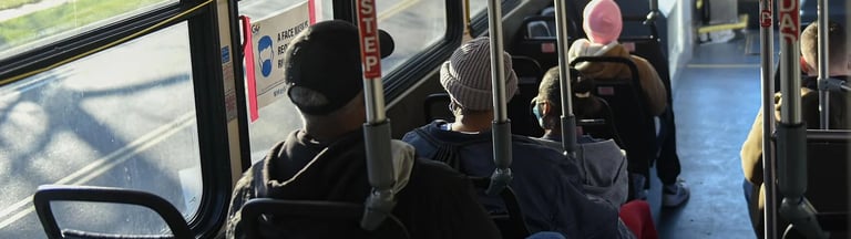 Photo taken from the back of a public bus