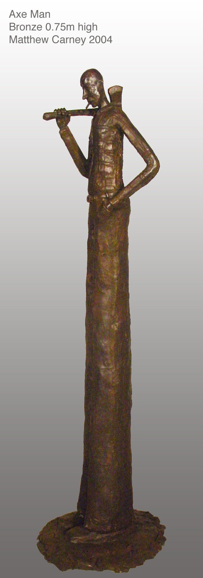 a bronze statue of an axeman with an axe on his should