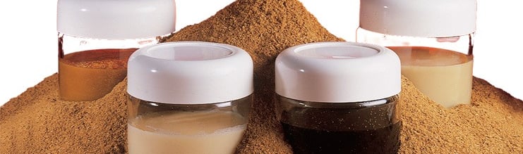 a variety of spices and spices in a pile of sand