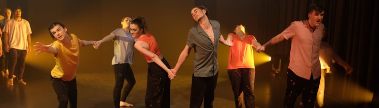 a group of people standing on a stage