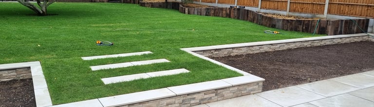 800m2 Full Garden Remodel Curved Sleeper Retaining Wall Planters, Lawn & Split-face Tiled Wall Step