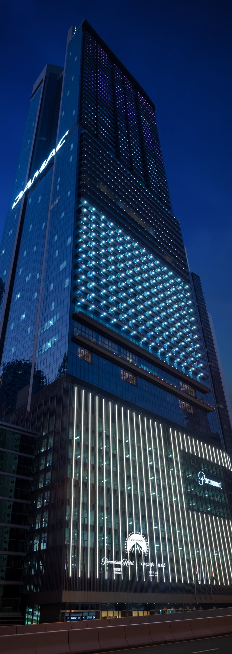 a tall building with a large glass window