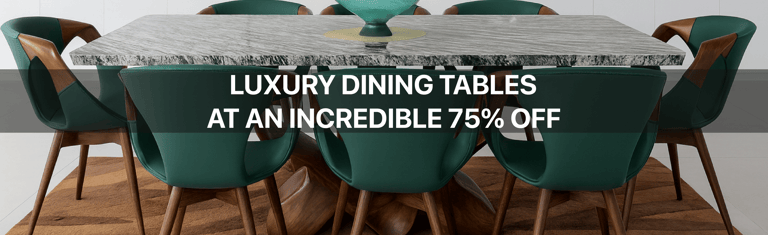 Luxury marble dining table with green velvet chairs on a modern area rug.