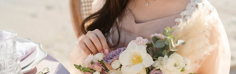 Elegant bride holding bouquet during prewedding at Melasti Beach Bali