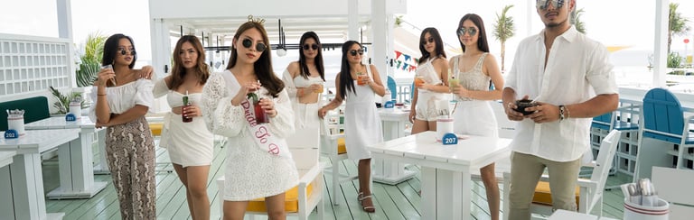 Bridal party having fun during bachelorette celebration at Batu Belig Beach Seminyak Bali