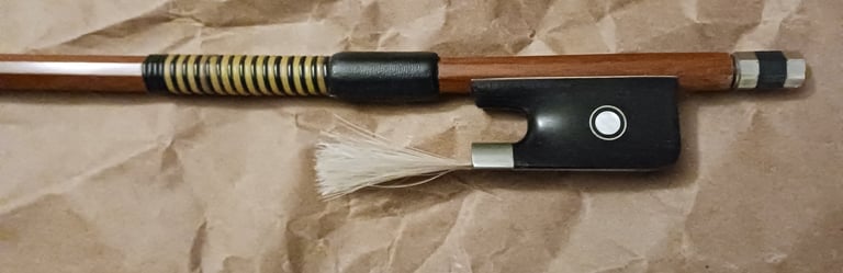 Cello bow with an imitation whalebone winding and a black goatskin grip