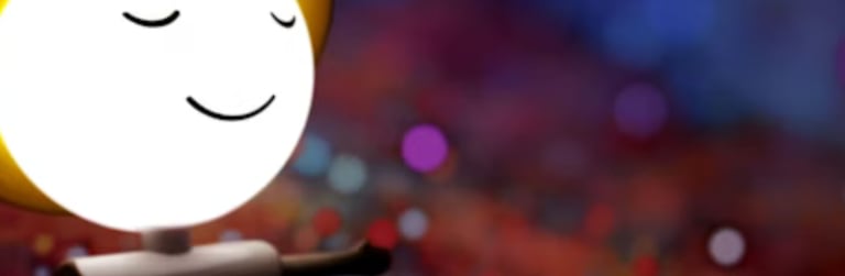 a smiling face with a light bulb on it