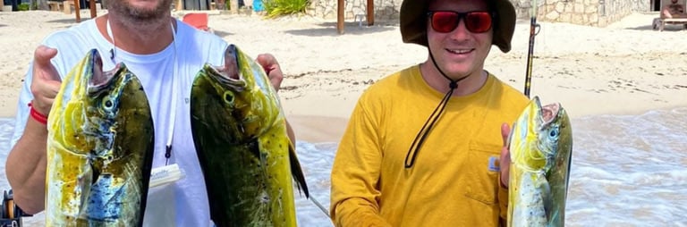 a man and a woman holding fish fish