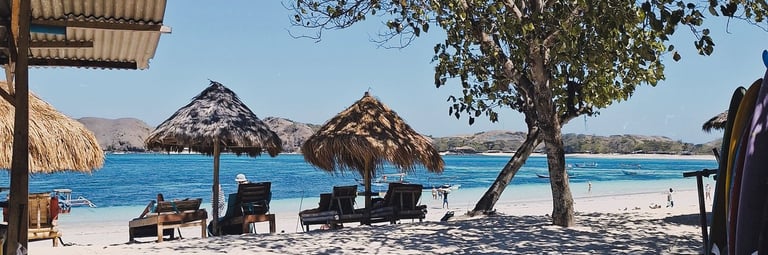 Beautiful view of Tanjung Aan Beach in Lombok with turquoise waters and soft white sand.