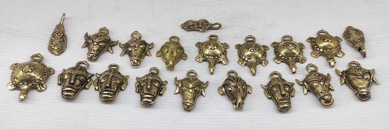 "Handcrafted brass key rings with different tribal designs–front view-Shipped worldwide"