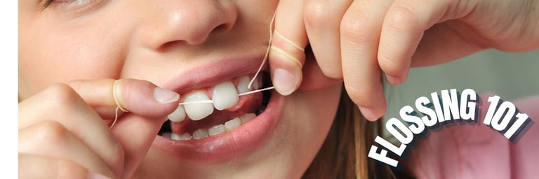 a girl is holding dental floss depicting flossing
