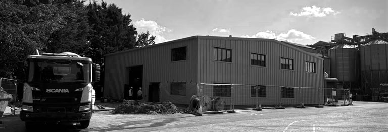 Completed industrial warehouse exterior in East Anglia designed for commercial logistics efficiency.