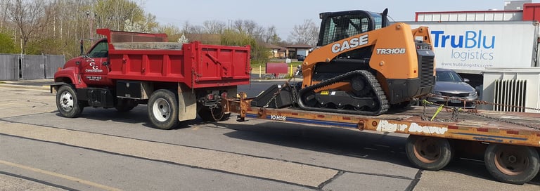 moving tracked skid steer 