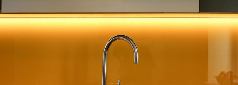 a kitchen sink with a sink and a counter top