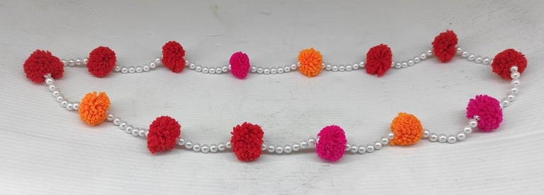 "Handcrafted artificial tribal-style necklace with multicolor flower embellishments-for global markets"