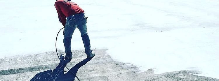 coating or spraying a roof coating rubber system