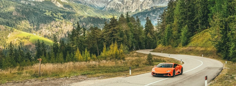 Lamborghini in front of landscape
