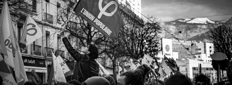 a women holding a banner in a strike