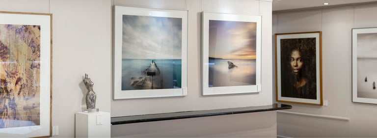Interior of Osner Gallery in Hout Bay, featuring fine art photography, original artworks, by Martin and Samantha Osner