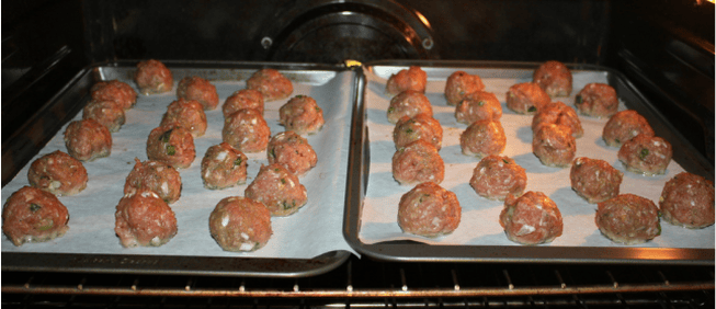 uncooked green curry turkeyballs in oven