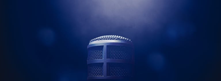 a microphone with a microphone in the background