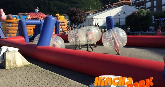 a man in a bubble bubble ball game