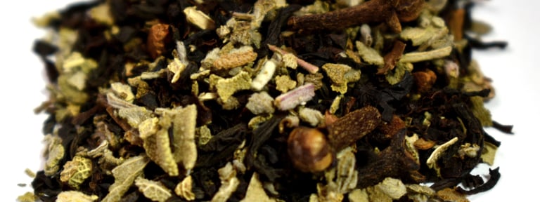 Close up image of our loose leaf spiced sage tea. Contains black tea, sage, cinnamon, and cloves.