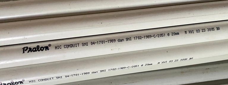 a stack of pipes and pipes in a warehouse Distributor Pralon