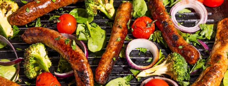 Sustainable plant-based, nutritionally-dense, hypoallergenic protein and fibre sausages with vegetables surrounding