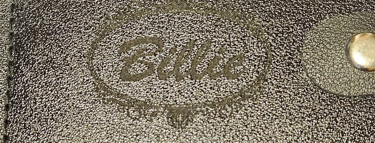 Close up view of engraving on black leather