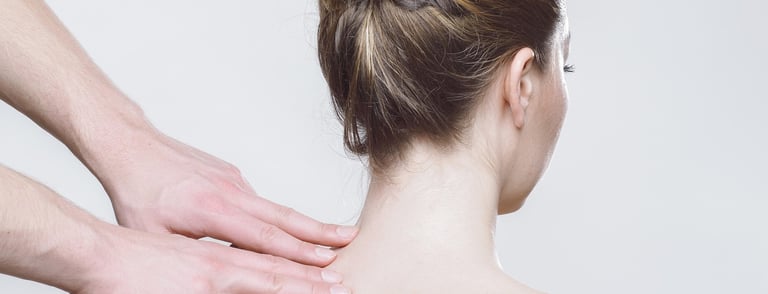 woman receives neck massage